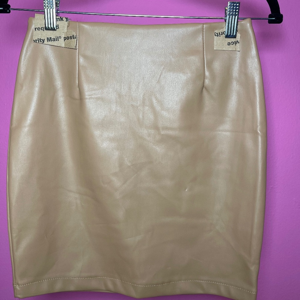 Tan colored, faux, leather skirt, zipped back, lined, some stretch, NWT